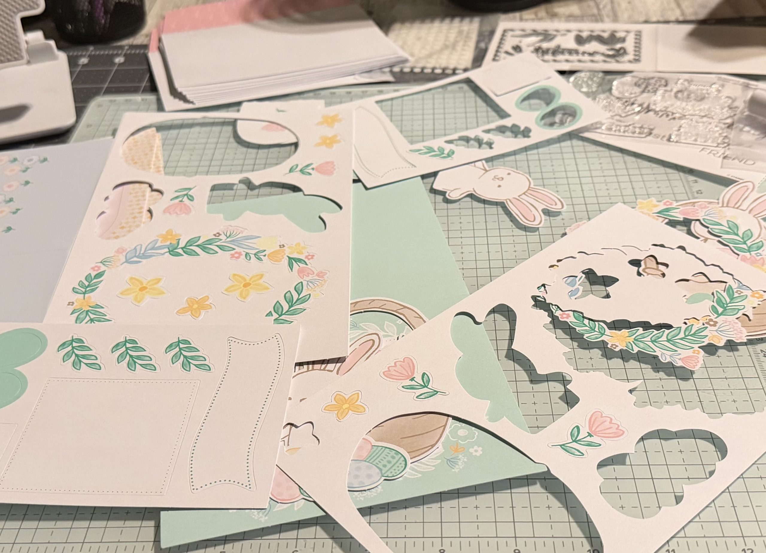 Messy desk with paper pieces every where. Creative chaos in process!